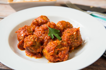 Meatballs on tomato