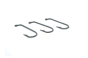 Rusty old fish hook, isolated on white background.