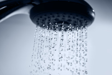 Fototapeta na wymiar Shower head and water drops.