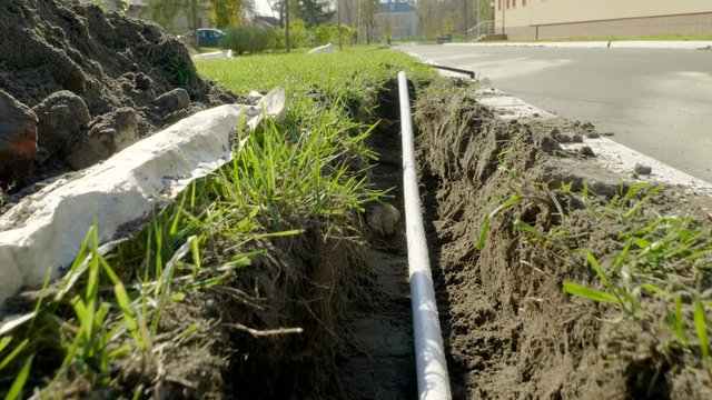 Making of automatic system for watering plants and lawn in the garden. 4K