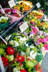 Florist shop selling multicolored diverse scented flowers bouquets - tilt-shift lens used