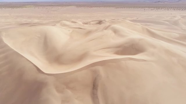 Sand dunes in the desert aerial view from above - aerial photography