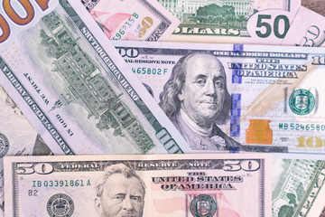 Money USA dollar banknotes for background.Money is any item or verifiable record that is generally accepted as payment for goods and services and repayment of debts