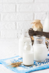 Milk in bottles of various shapes and sizes