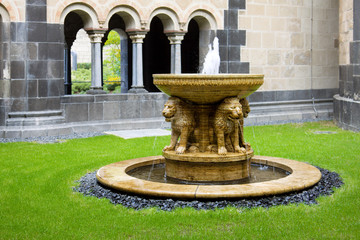 The Lion fountain in the courtyard of the Maria Laach abbey in Germany