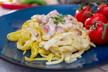 tasty Carbonara pasta on the table