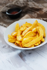 Golden French fries potatoes ready to be eaten