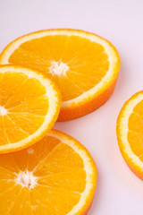 Obraz na płótnie Canvas Tropical background orange slices fruits