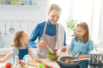 Happy family in the kitchen.