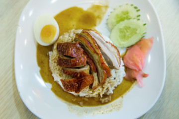 Roasted duck on rice, focus selective,