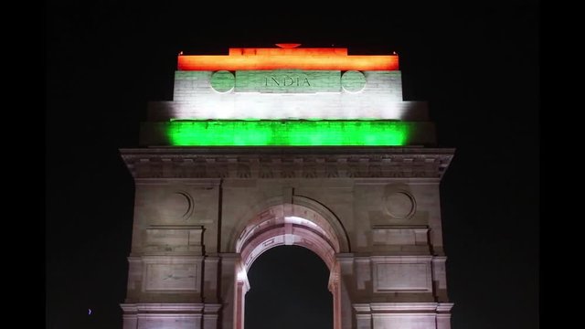 India gate lit with tricolor led lights on it. The India Gate is a war memorial located astride the Rajpath, on the eastern edge of the "ceremonial axis" of New Delhi, India, formerly called Kingsway.