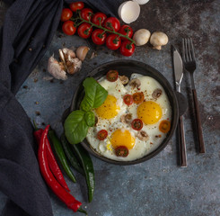 fried eggs with vegetables