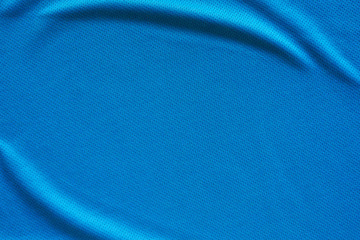 Blue fabric sport clothing football jersey with air mesh texture background