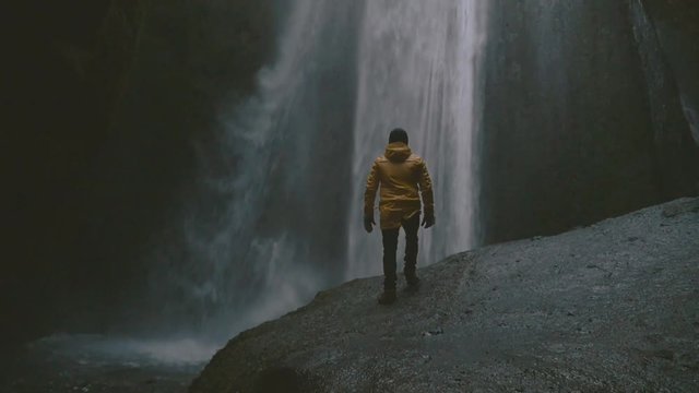 Man exploring lands of Iceland