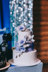 wedding cake with flowers yellow beige red turquoise blue