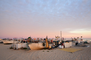 Fototapeta na wymiar fishing boats on the beach of Monte Gordo, Algarve, Portugal
