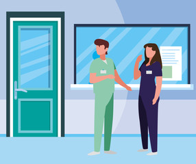 couple medicine workers in hospital reception