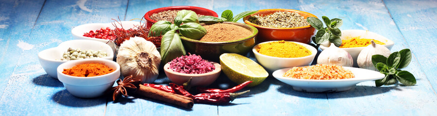 Spices and herbs variation on table. Food and cuisine ingredients.