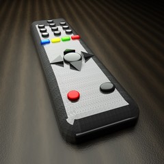 Remote control for tv over wooden table