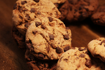 Chocolate cookies on wooden table. Chocolate chip cookies