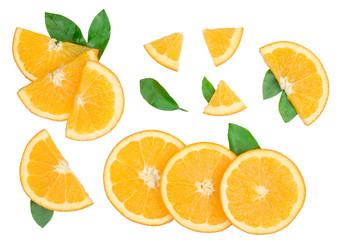Slices of oranges with leaves isolated on white background. Flat lay, top view