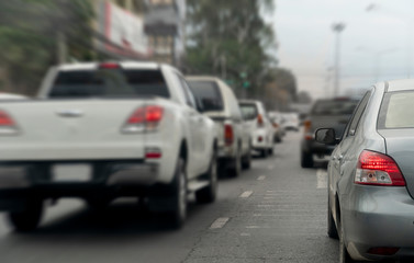 Cars on the road in traffic junction there are many cars on the road.