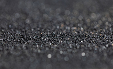 Sandpaper black bokeh light effect with soft  background