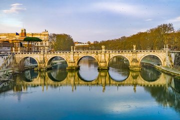 Fototapeta na wymiar Bernini Angels Ponte Saint Angelo Tiber River Reflection Evening Rome Italy