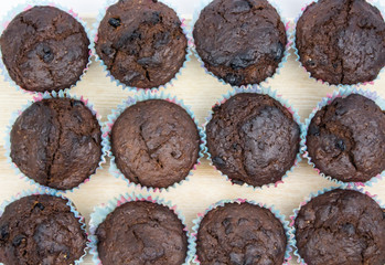 Fresh homemade muffins. Chocolate cupcakes. background of muffins. copy space