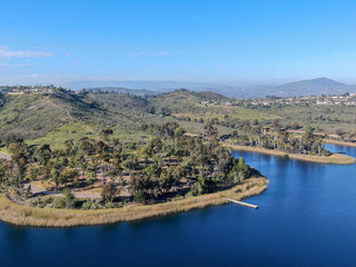 Aerial view of Miramar reservoir in the Scripps Miramar Ranch community, San Diego, California. Miramar lake, popular activities recreation site including boating, fishing, picnic & 5-mile-long trail.