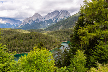 Beautiful landscape with montains and the lake in cloudy day