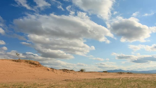4K. Clouds over a dune in the Gobi Desert, Mongolia. Ultra HD, 4096x2304