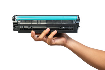 Used laser toner cartridge holding by hand of worker or user for replace, refill  with white background. Laser toner for eco and recycle concept. - obrazy, fototapety, plakaty