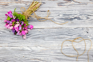  Anemones on a wooden background