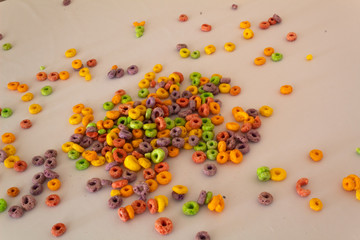 top view of colorful cereal with white background