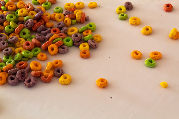 top view of colorful cereal with white background