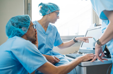 Doctor using computer at the hospital. Medical concept