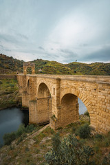Obraz premium The Alcantara Bridge also known as Trajan Bridge at Alcantara is a Roman bridge at Alcantara, in Extremadura, Spain.