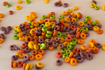 Fototapeta na wymiar top view of colorful cereal with white background