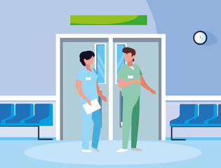 couple medicine workers in elevator door