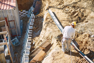 Construction worker on a heavy site doing hard work.