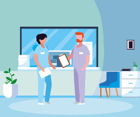 couple medicine workers in hospital reception