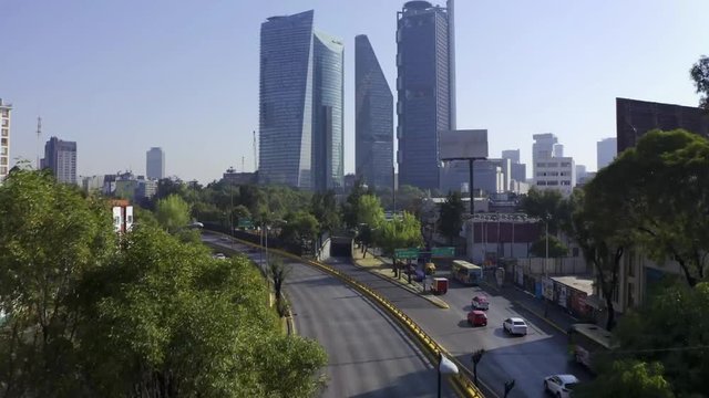 DRONE FLIGHT OVER BUILDINGS AND SKYSCRAPERS. CIRCUITO INTERIOR AVENUE. MEXICO CITY.