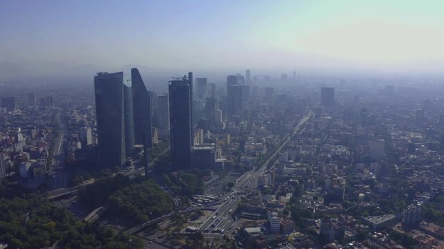 DRONE FLIGHT OVER BUILDINGS AND SKYSCRAPERS. CIRCUITO INTERIOR AVENUE. MEXICO CITY.