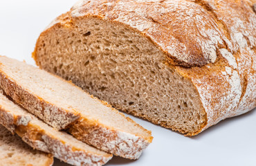close up of cutted rye round bread on