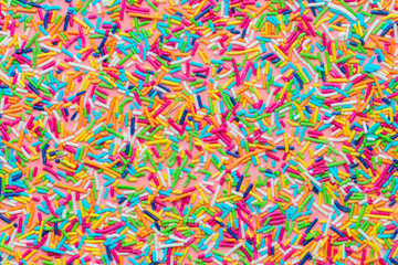 trendy pattern of colorful sprinkles like background, sweet decoration