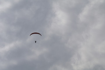 paraglider in the sky,sport, paraglider, fly,extreme, flying, air, adventure, freedom, clouds, sports,cloud, flight, activity,   