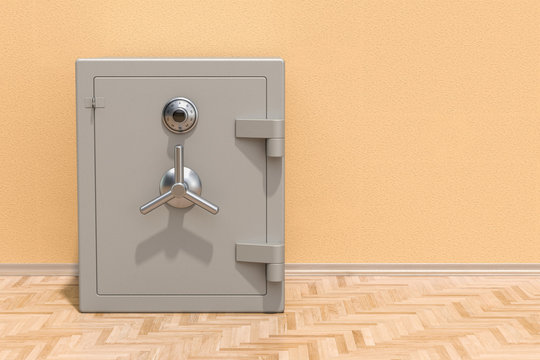 Safe box with combination lock on the floor in the room, 3D rendering