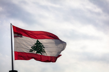 The Lebanese flag flying over Beirut, Lebanon in Spring
