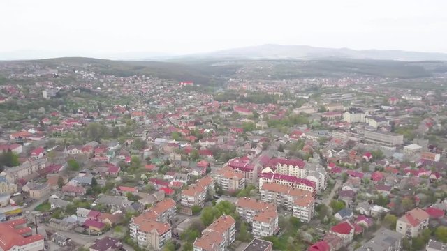 Drone Aerial Panorama of Uzhhorod City in West Ukraine Zakarpattia Region on Spring Day With Residental Buildings and Houses